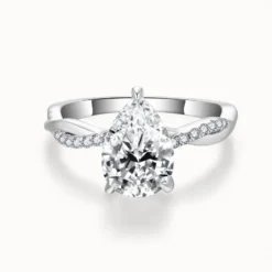 2ct Pear Cut Moissanite Twist Side Stone Ring